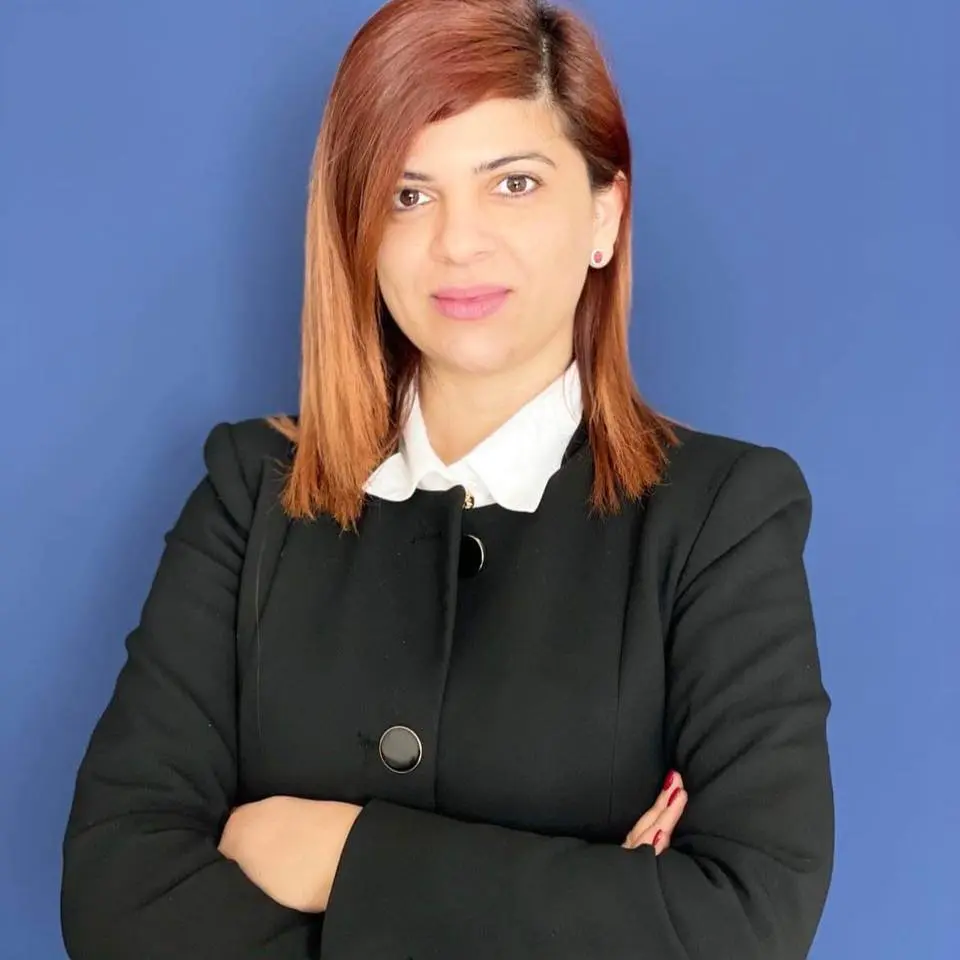 Professional portrait of Christiana Constantinou, managing partner and lawyer providing legal services in Paphos, Cyprus